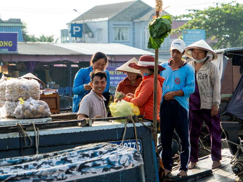 Can Tho: Explore Mekong, Floating Market, Cacao & Local Life - Cai Rang floating market breakfast: noodles, river bargains, and people at work