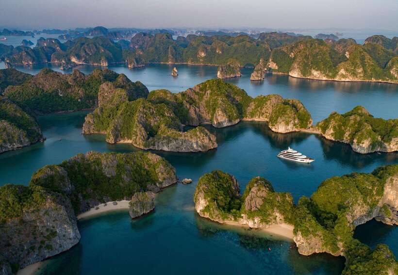 Cat Ba: Full- day trip with biking, kayaking, meal, tickets - Kayak Time in Bright, Dark, and Bat Caves (and the Bamboo-Boat Swap)