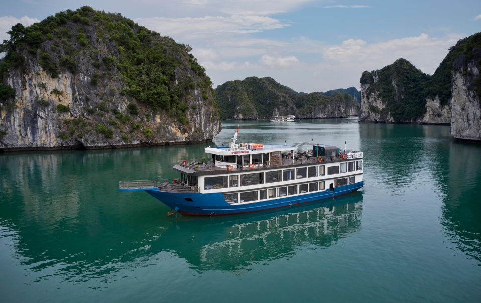 From Halong: 2 Days / 1 night with Halong - Lan Ha tour - Night on board: spring rolls demo, sundeck sunset party, and real downtime