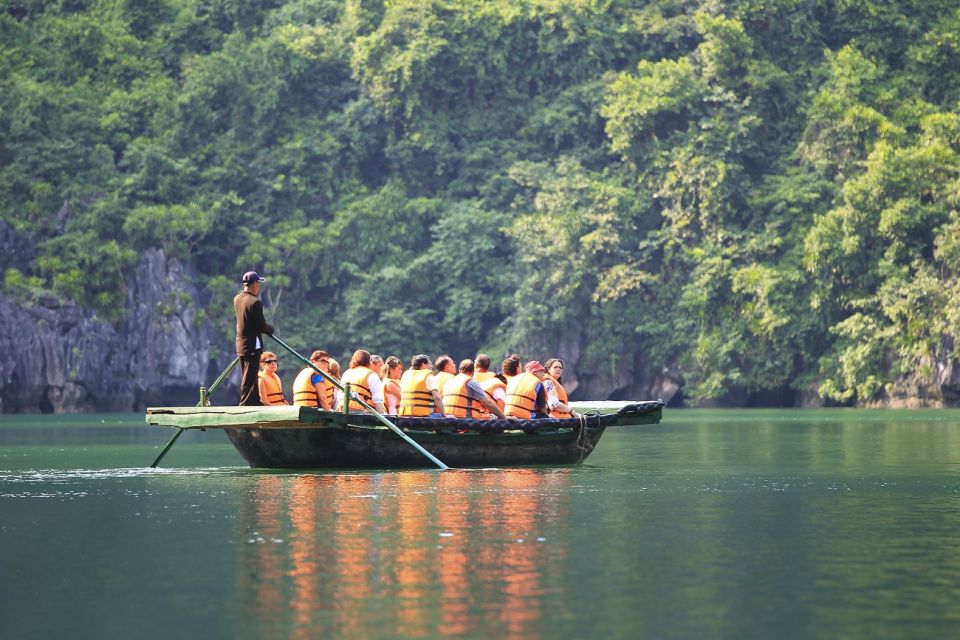 From Hanoi: 2-Day Ha Long Bay Tour with Ninh Binh and Cruise - Titop Island: swim time and photo options
