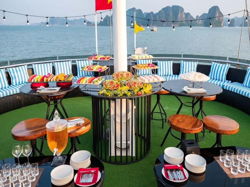 From Hanoi: Halong bay Luxury tour on 5 star cruise - Luon Cave: Kayaking or Bamboo Boat Through the Lagoon