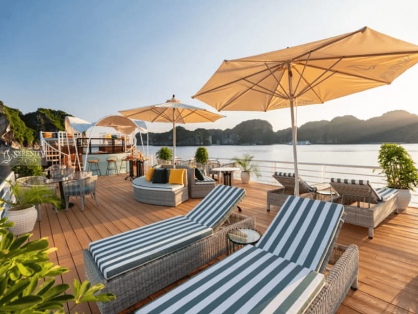 From Hanoi: Lan Ha Bay and Cat Ba Island Cruise with Lunch - Rooftop downtime, sunset party snacks, and returning to Hanoi