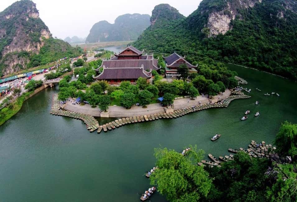 From Hanoi: Trang An eco-tourism - Hoa Lu ancient & Mua Cave - Trang An eco-tourism by boat: caves, cliffs, and rice-paddy scenery