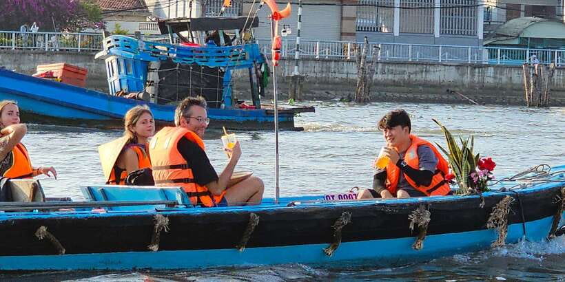 From HoChiMinh: 2 Day Mekong Delta Tour exit Phu Quoc Island - Starting in District 1: pickups, bus time, and how day one flows